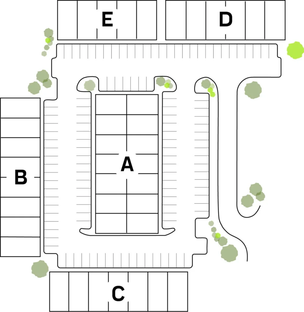 Site plan with labeled zones A–E, surrounding parking, driveways, and trees.