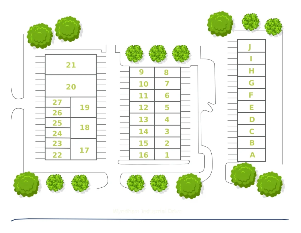 Site layout of parking blocks with numbered stalls (1–16 center, A–J right), trees, and Wyndham Industrial Drive label.